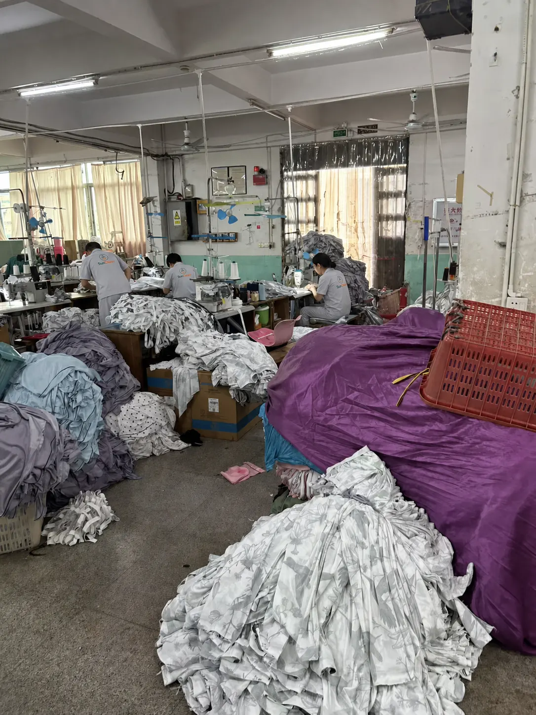 SunCheer sewing team producing padded jacket components